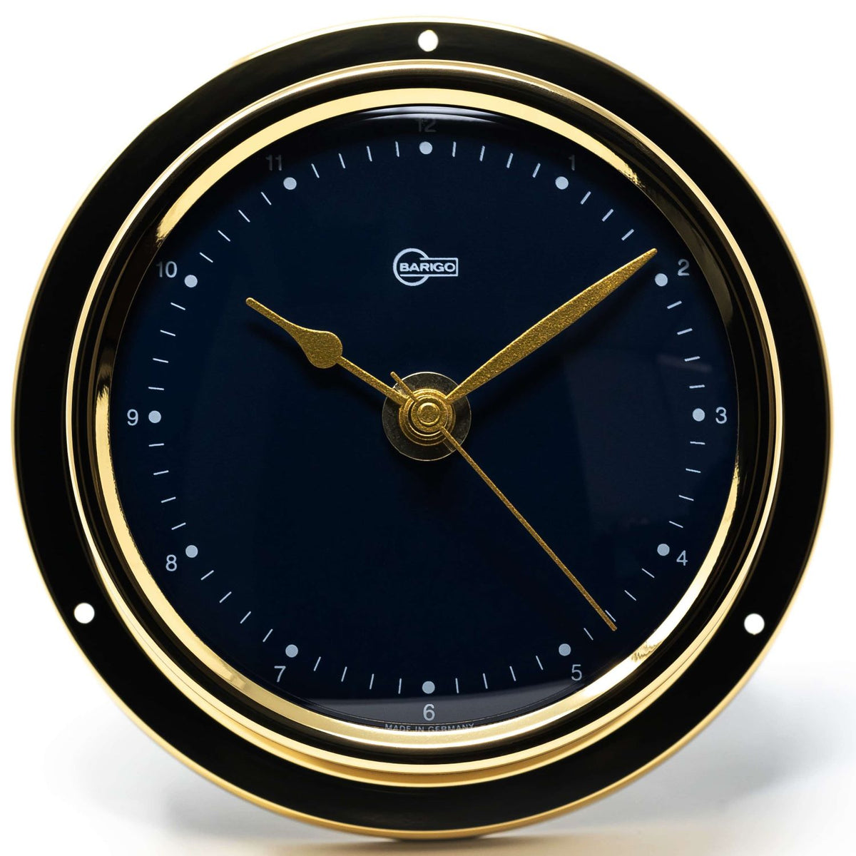 Gold-rimmed nautical wall clock with black face and gold hands, marine clock design