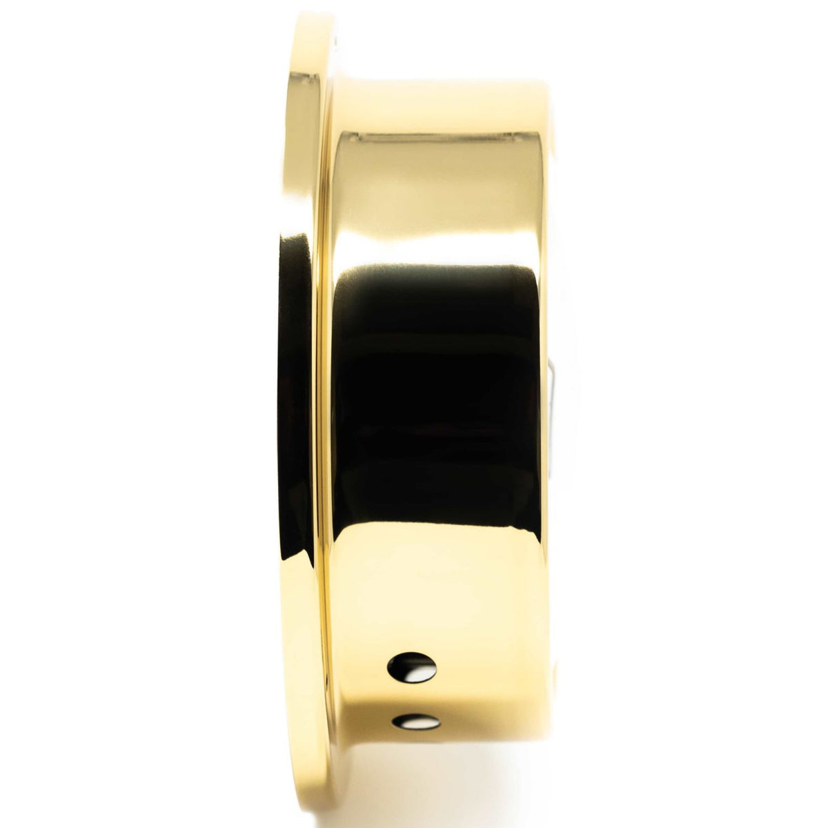 Side view of a polished brass barometer or clock case with a white background