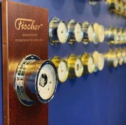 Wall display of German barometers and weather instruments with brass finishes