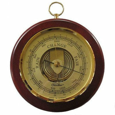 Classic round brass barometer with wooden frame, weather gauge dial, and wall mount ring