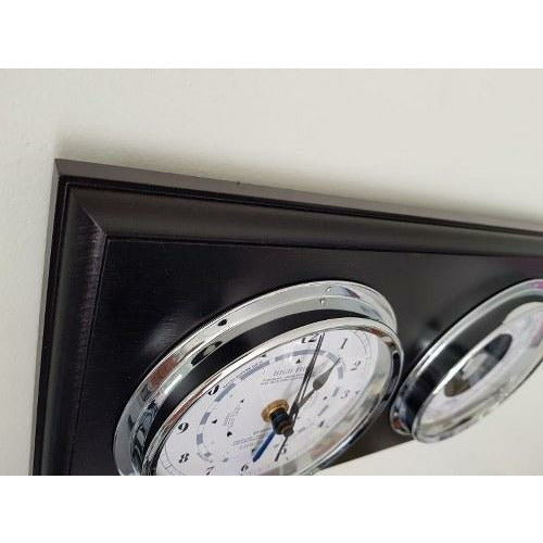 Black and Silver Tide and Time Clock Above