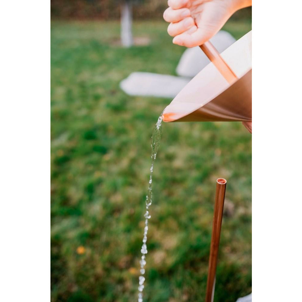 Rain gauge made of solid copper