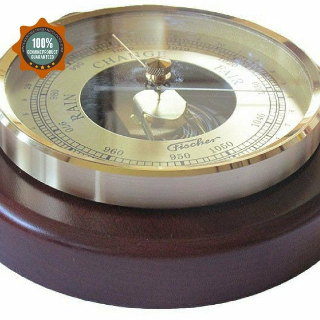 brass and wood barometer
